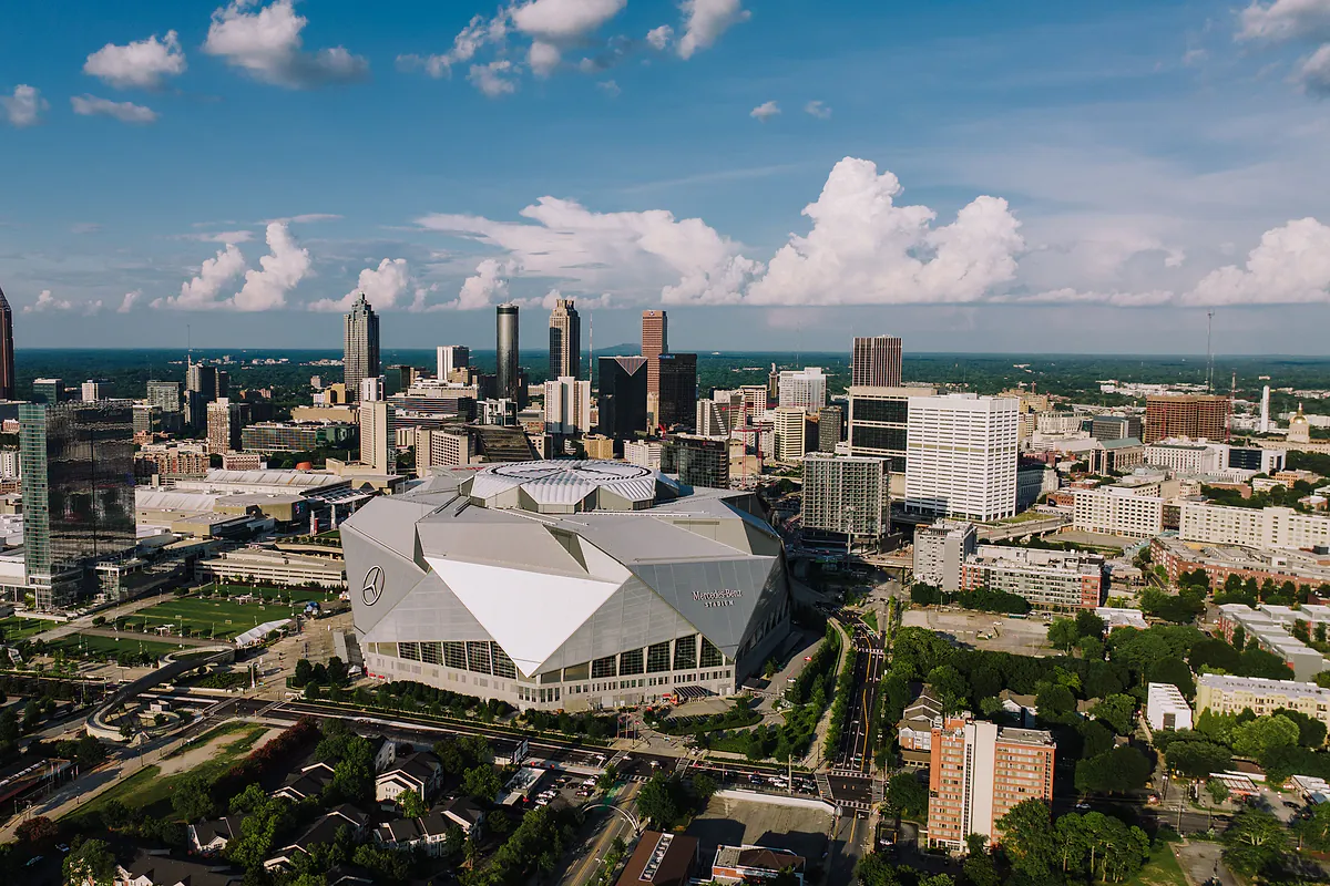 Atlanta skyline with Mercedes-Benz Stadium in the foreground