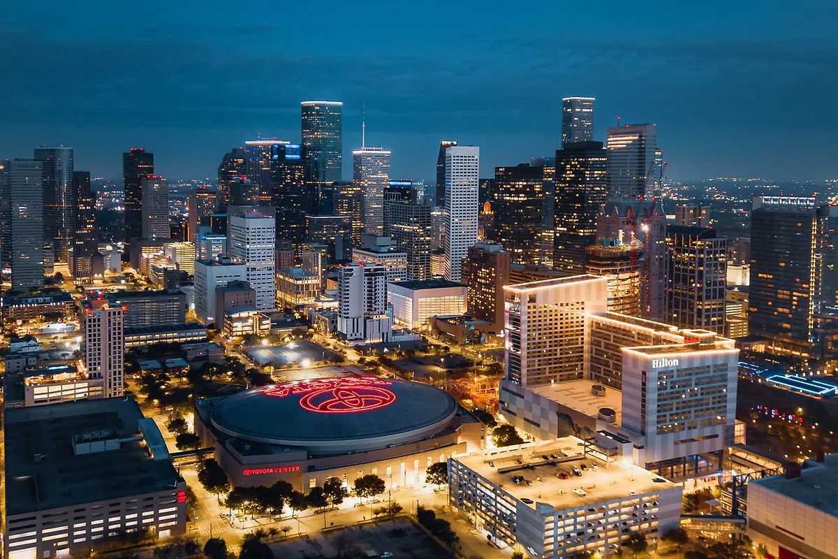Downtown Houston skyline illuminated at blue hour