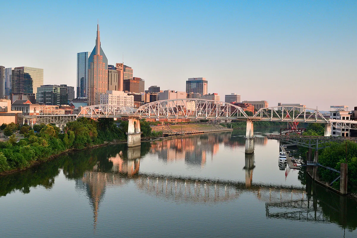 Downtown Nashville and pedestrian bridge at sunrise